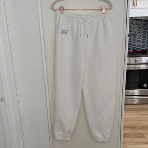 I.AM.GIA White Joggers with Rhinestone logo | L